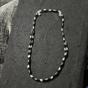 Two Magnetic Necklaces Black/white and Green/gun metal